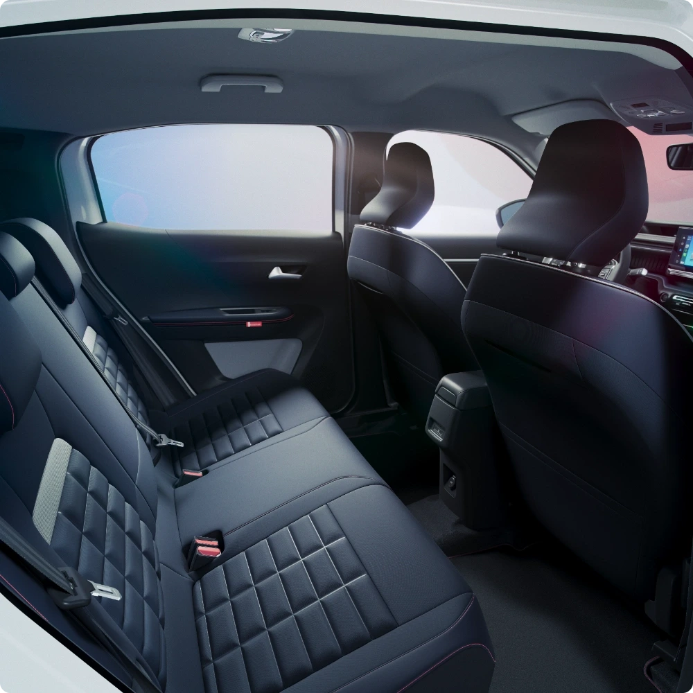 Rear interior view of Citroën ë‑C3 Aircross electric SUV showcasing lounge‑style seating for relaxed, spacious and affordable mobility.