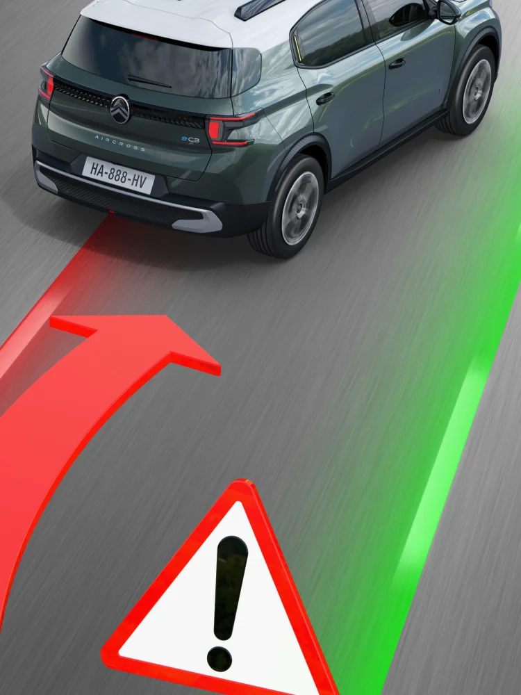Citroën SUV showing lane departure warning with projected red and green lane visuals on the road