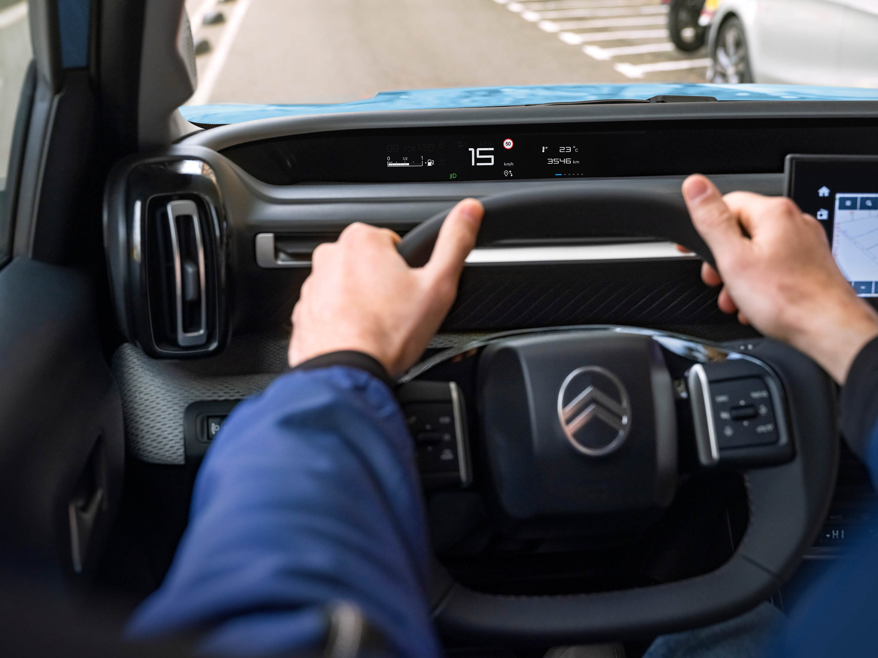 Driver cockpit view of Citroën C3 SUV highlighting digital display for intuitive, affordable and comfortable urban mobility.