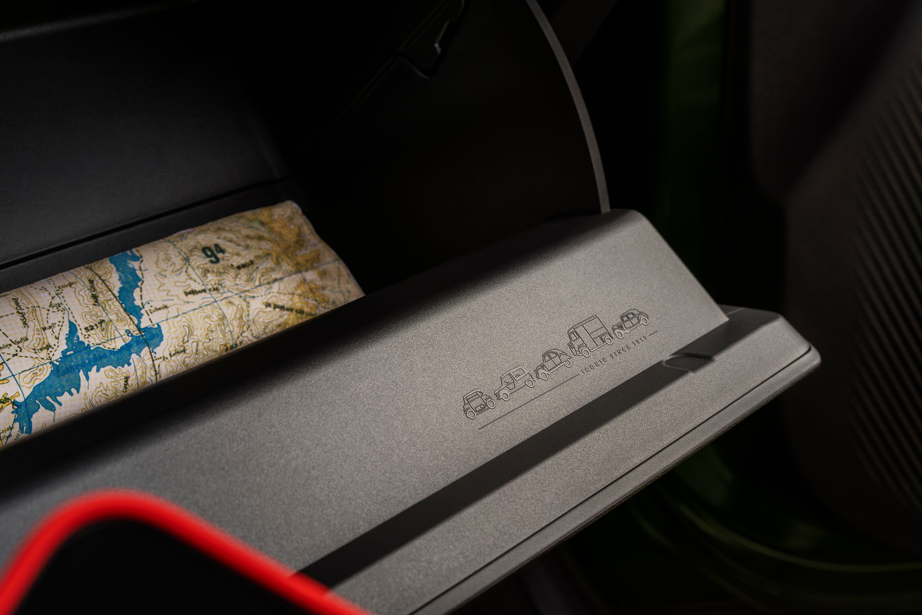 Close‑up interior view of Citroën ë-C3 Aircross SUV showing practical dashboard storage space for versatile, convenient and affordable mobility.