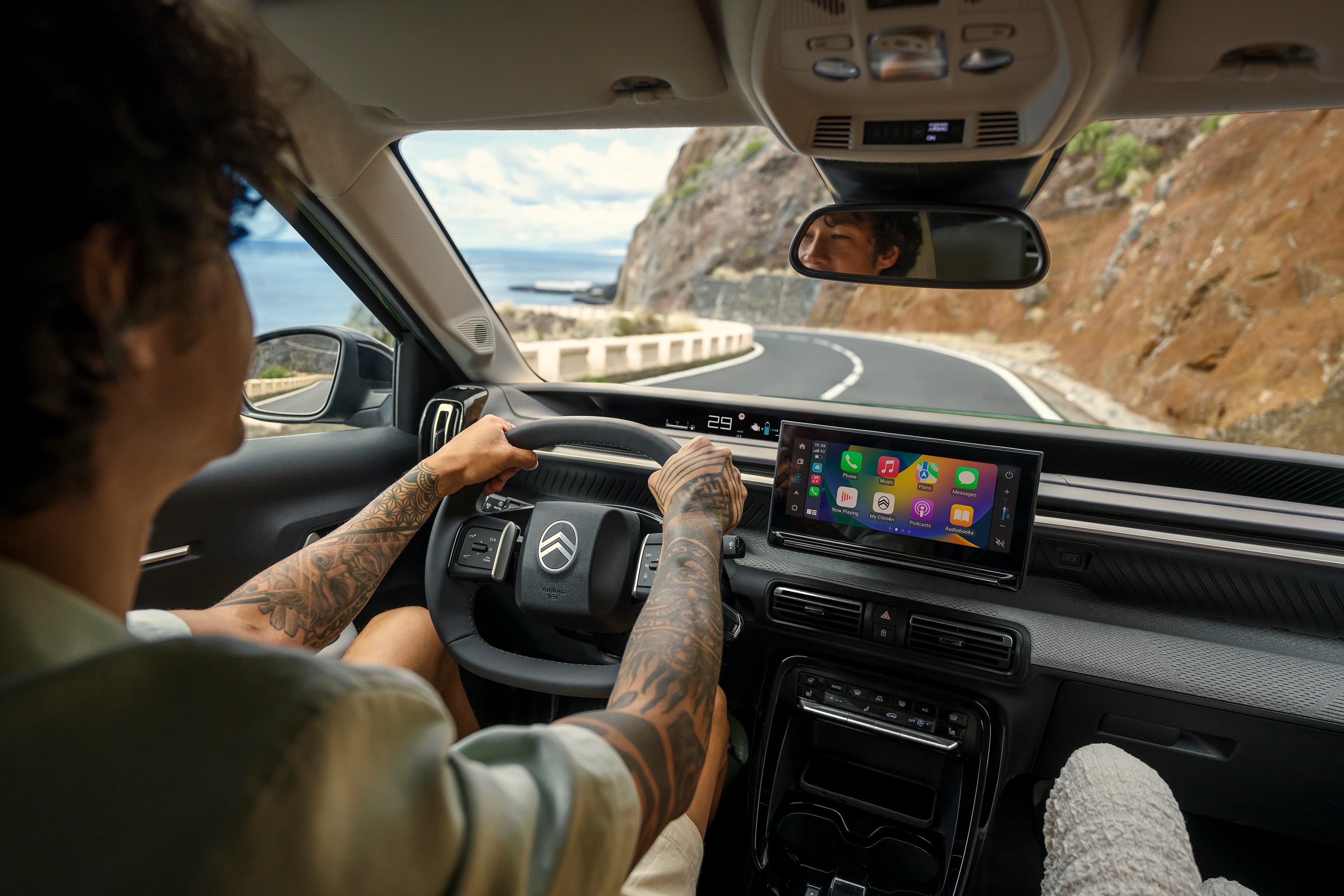 Driver‑view of Citroën ë-C3 Aircross SUV highlighting large touchscreen and modern cockpit for intuitive, connected and affordable everyday driving.