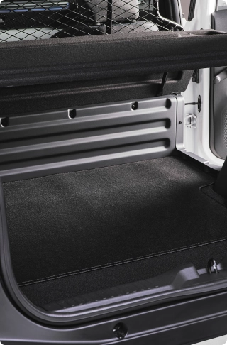 Close-up view of the Citroën ë-C3 Van cargo compartment, highlighting the practical load space and protective interior lining.