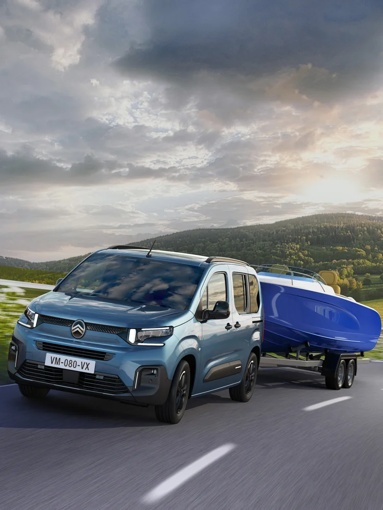Front view Berlingo towing a trailer with Trailer Stability Control enhancing safety, stability and confident driving