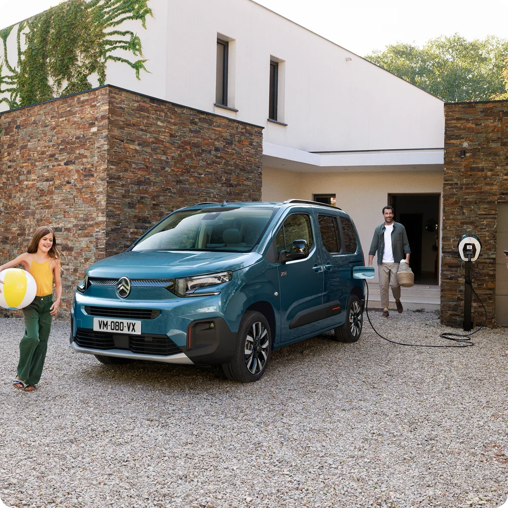 Side view Kiama Blue ë‑Berlingo charging showing safety, efficiency, technology and confident everyday public‑charging use
