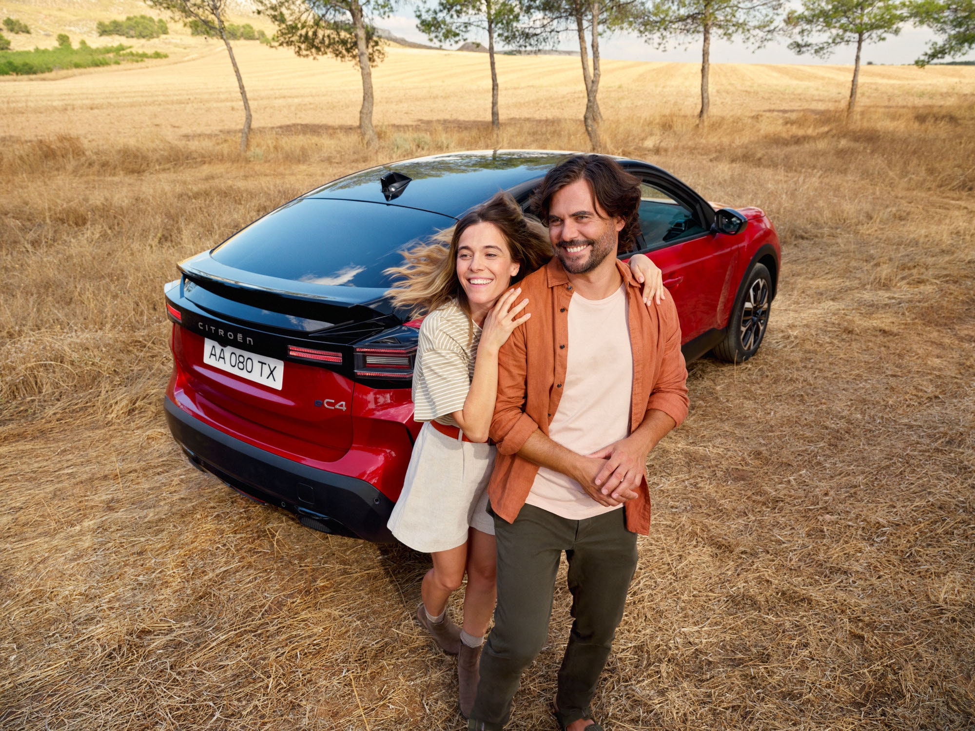Three‑quarter rear view ë-C4 showcasing stylish design, safety, aerodynamics and comfort for a serene outdoor presence