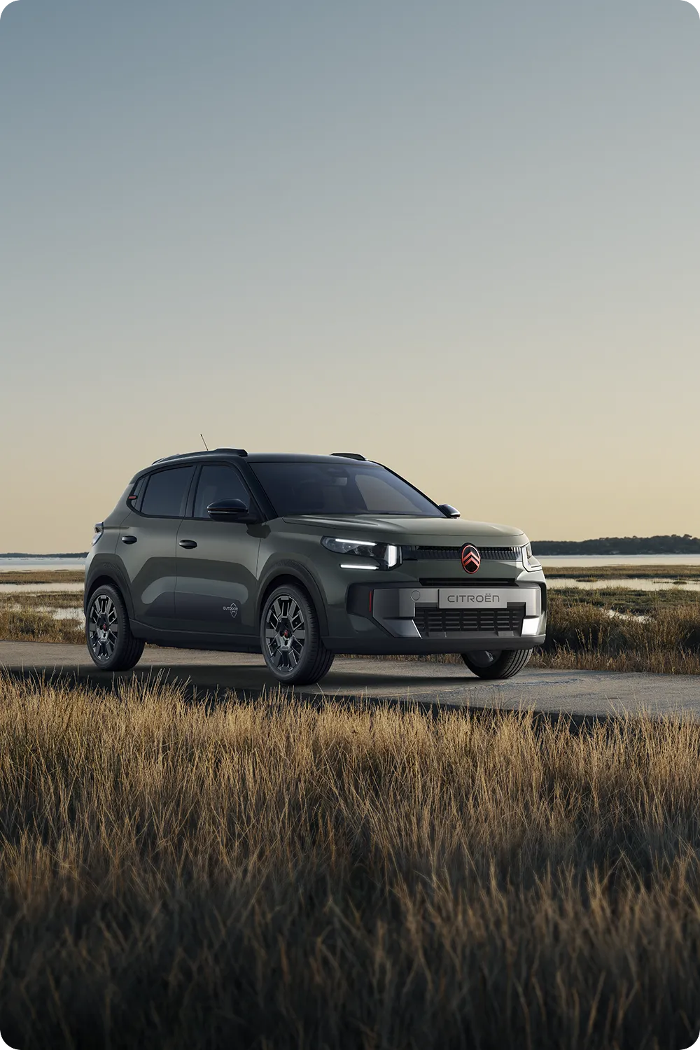 Front 3/4 view of Citroën C3 Outdoor, robust, versatile and comfortable crossover with innovative styling for coastal journeys
