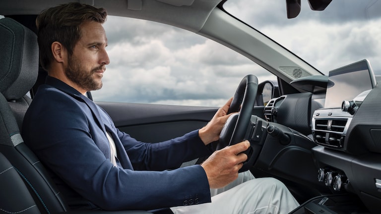 Man driving Citroen EV